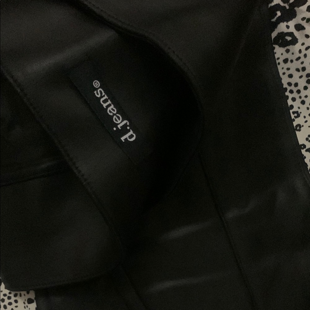 Black spandex type leather material jeans